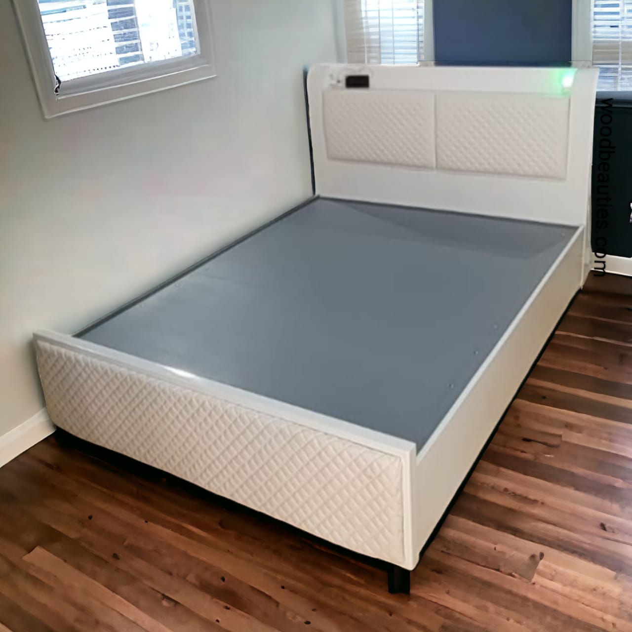 White Head Board Cushioned Bed